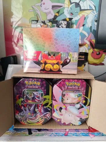 Avant première pokebox ecto/mélo et Mini tin illumis